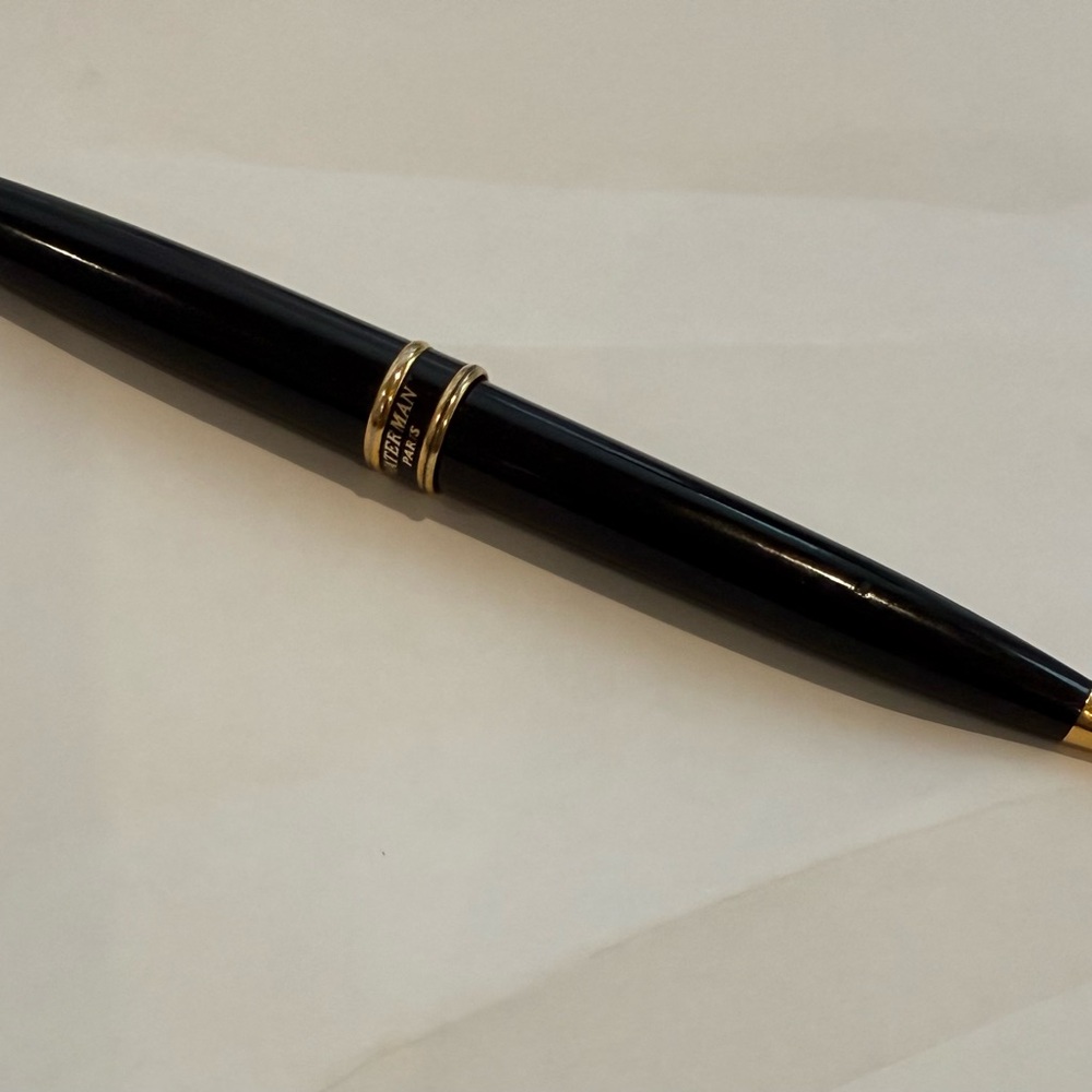 Elegant Black and Gold Ballpoint Pen with new refill